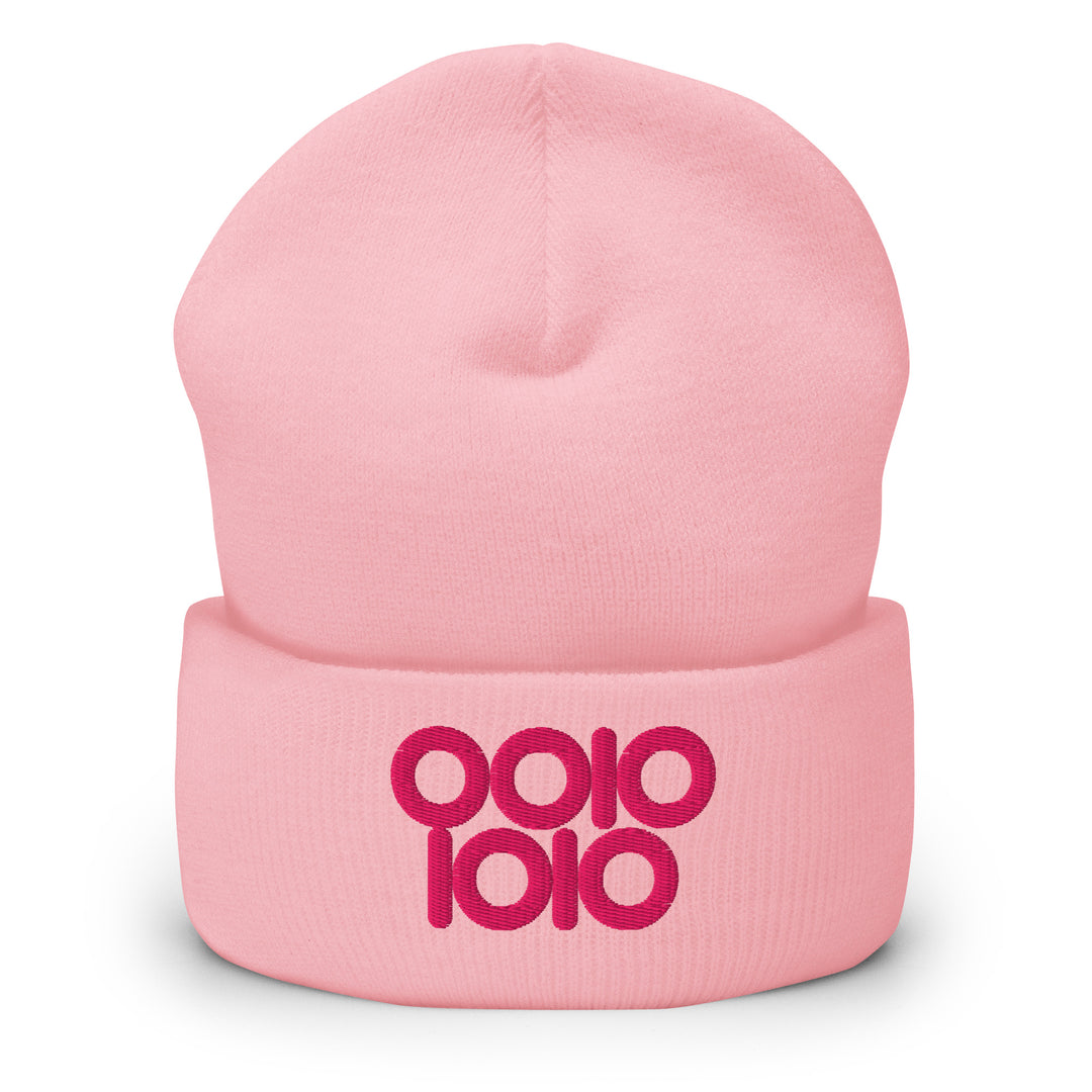 Pink beanie embroidered with “0010 1010” in hot pink thread, a playful binary 42 design with ring-style zeros.