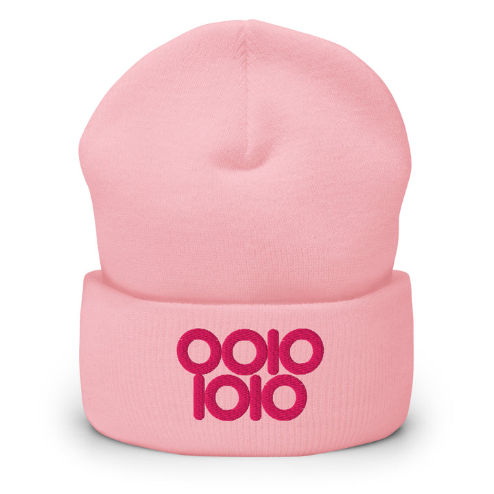 Pink beanie embroidered with “0010 1010” in hot pink thread, a playful binary 42 design with ring-style zeros.
