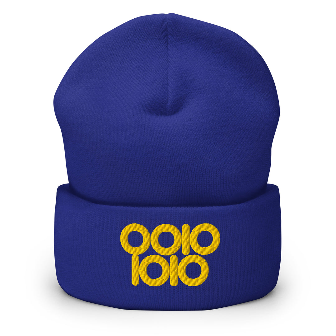 Royal blue beanie embroidered with “0010 1010” in gold thread, symbolizing 42 in binary with rounded ring zeros.