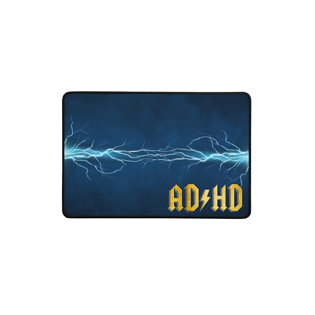 Blue AD/HD High Voltage desk mat featuring an electric lightning pattern and gold logo, designed for gaming, coding, and high-energy workspaces.