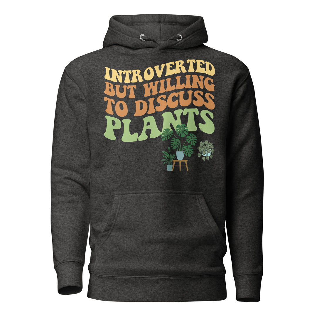 Front view of the dark heather gray “Introverted but Willing to Discuss Plants” hoodie with retro lettering and illustrated houseplants.