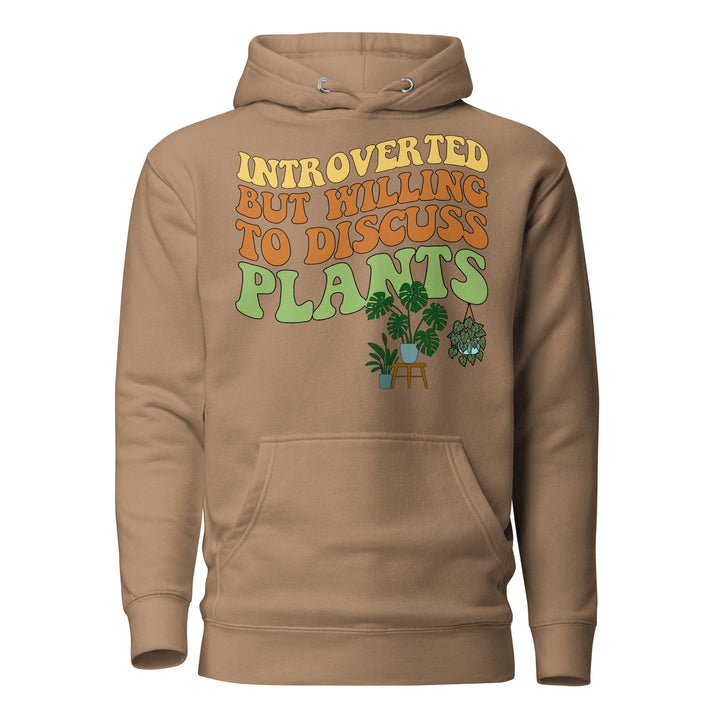 Front view of the light brown “Introverted but Willing to Discuss Plants” hoodie with retro lettering and illustrated houseplants.