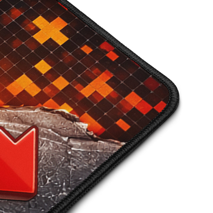 Close-up mockup of the stitched edge piping on a Keep It Geek desk mat, showing reinforced black edging and the retro cheat code pixel-art surface.