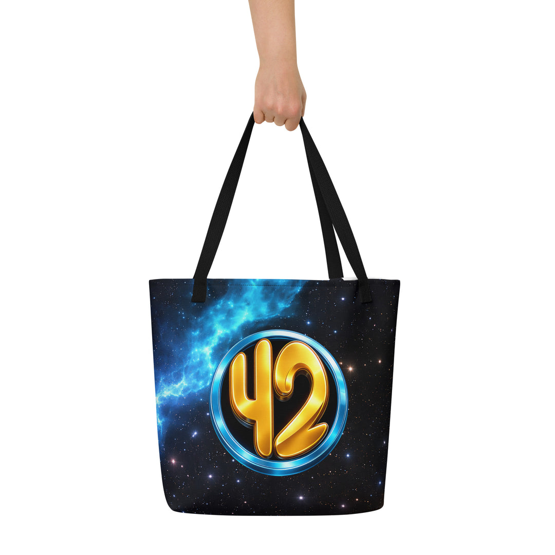 Back view of the Keep It Geek 42 cosmic tote bag with black handles, featuring a glowing gold “42” inside a metallic blue circle against a vibrant nebula starfield design.