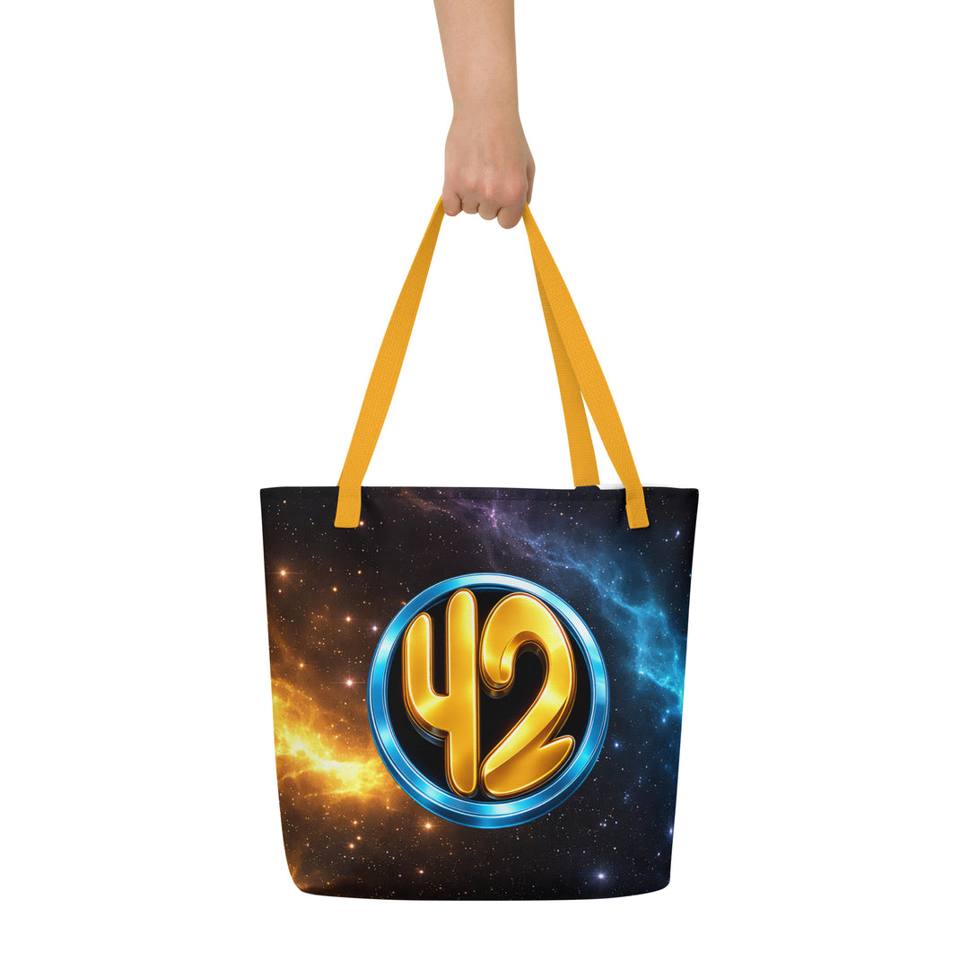 Front view of the Keep It Geek 42 cosmic tote bag with yellow handles, featuring a glowing gold “42” inside a metallic blue circle against a vibrant nebula starfield design.