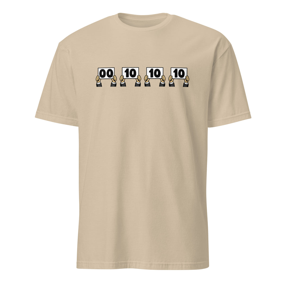Beige unisex t-shirt featuring “Everything is Judged in Binary” design with illustrated hands holding scorecards reading 00 10 10 10.