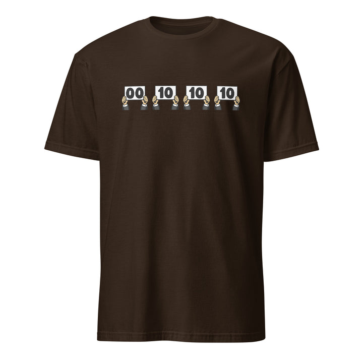 Brown unisex t-shirt featuring “Everything is Judged in Binary” design with illustrated hands holding scorecards reading 00 10 10 10.