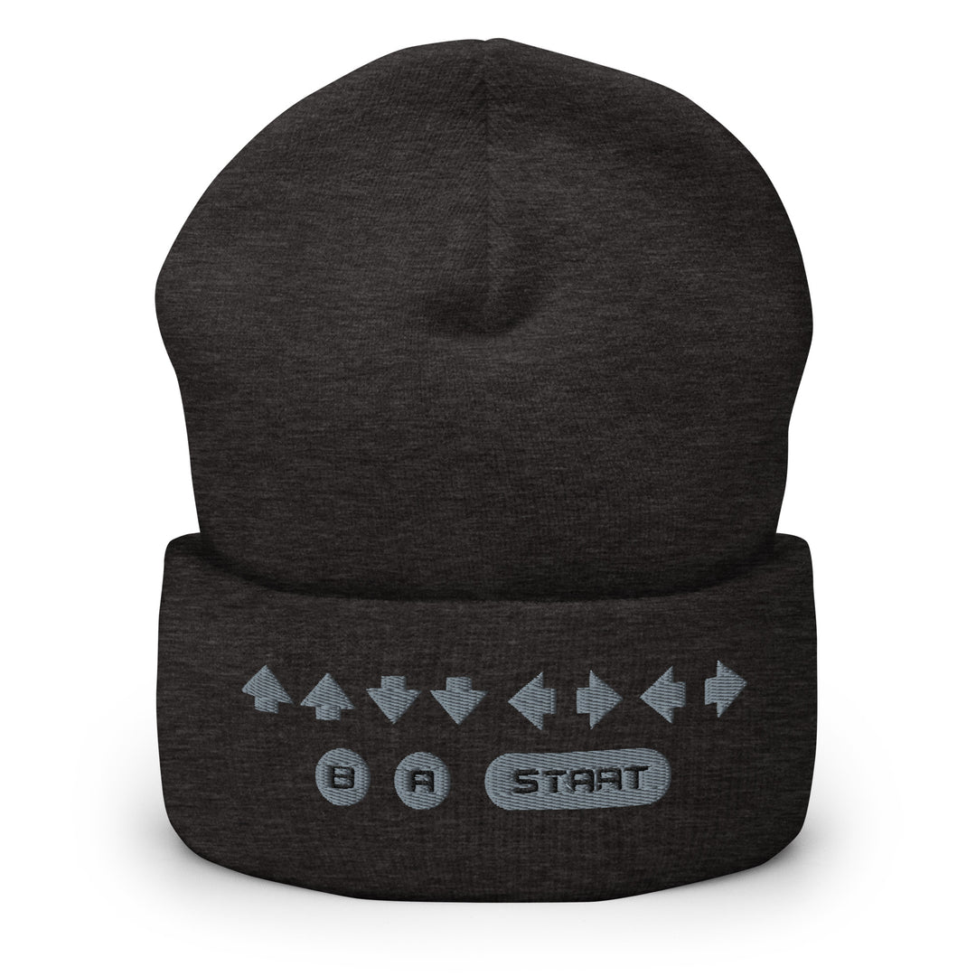 Front view of a charcoal cuffed beanie featuring embroidered retro cheat code arrows with B, A, and START icons on the folded cuff.