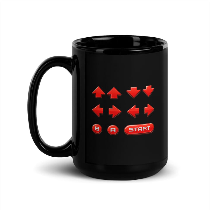 Right-side view of an 15 oz black ceramic mug featuring a retro cheat code button sequence with red directional arrows, B and A buttons, and a Start button.