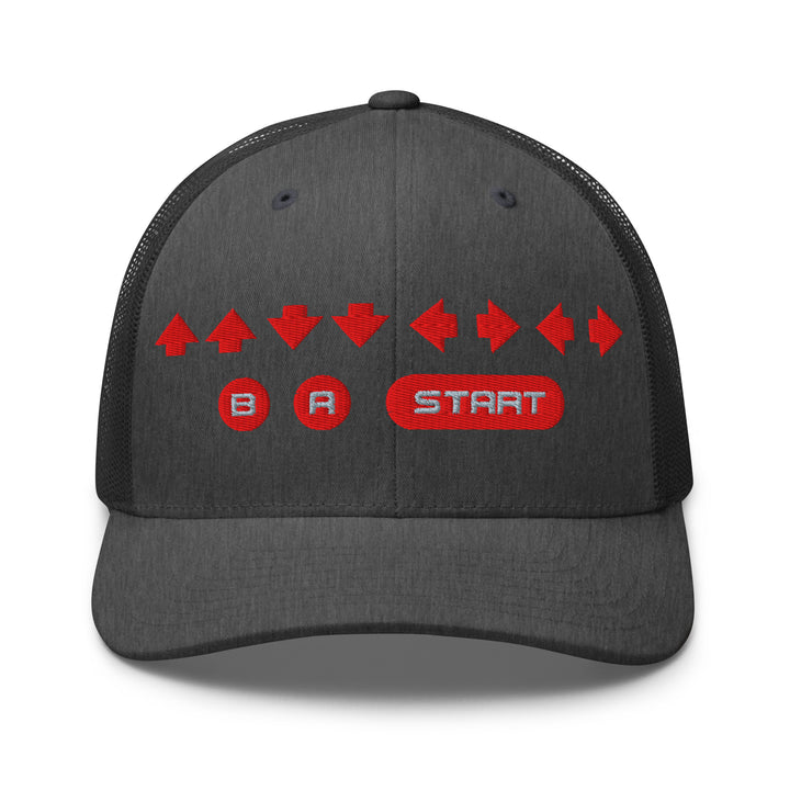 Front view of a dark heather gray trucker cap with red embroidered directional arrows and B A Start button symbols