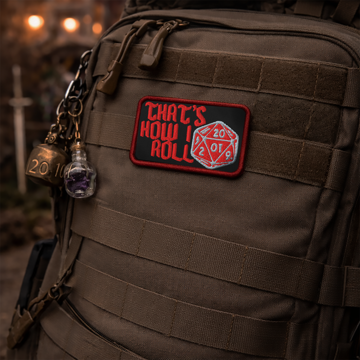 Embroidered “That’s How I Roll” D20 patch attached to a rugged backpack with a potion bottle charm in a fantasy convention setting with warm tavern-like lighting.