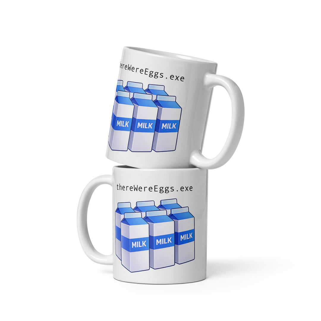 Lifestyle mockup of an 11 oz white ceramic mug featuring the “thereWereEggs.exe” design with six blue-and-white milk cartons, shown as a stacked mug arrangement on a white background.